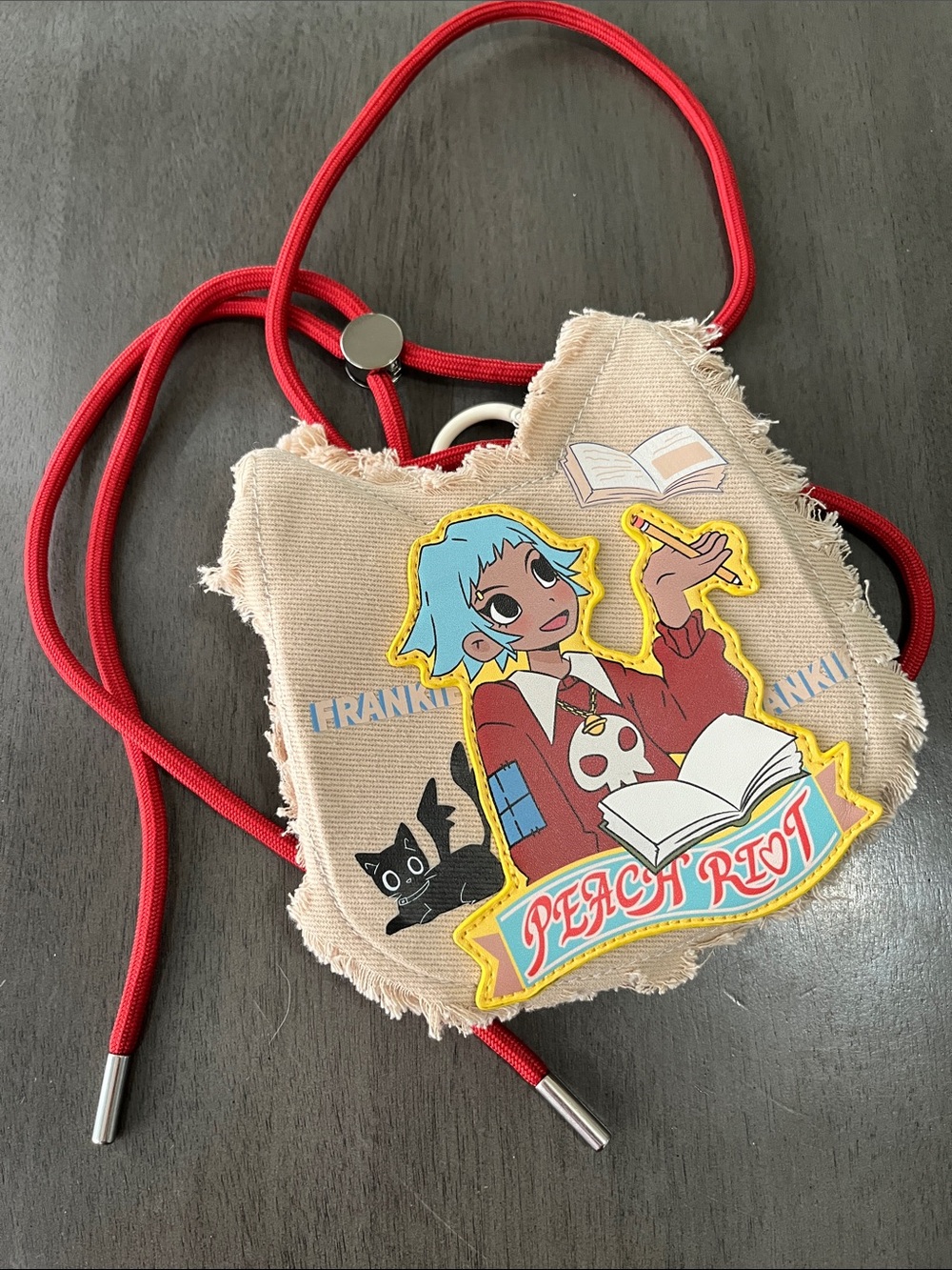 Peach Riot Mini Bag Beige Canvas Mini Crossbody with Red Strap and Playful Patch